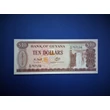 Kép 1/2 - 2016 Guyana 100 dollar UNC bankjegy. Sorszámkövető is lehet! Numizmatika - bankjegyek